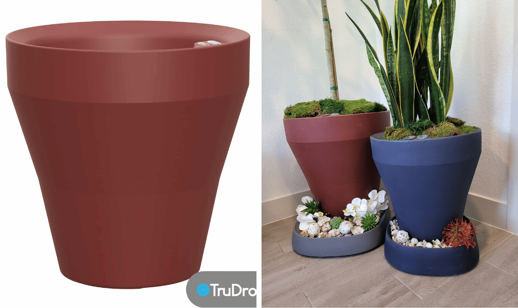 Rim planter in Currant, alongside Rims with Pebble Plant caddies.